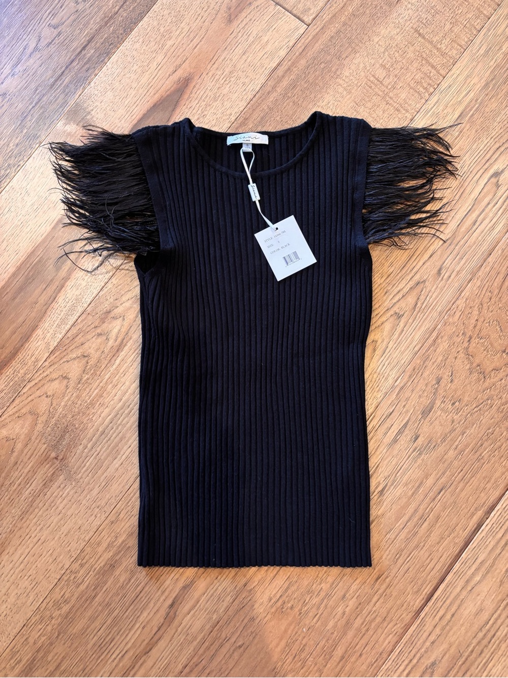 Sioni Black Ribbed Knit Top with feather detail